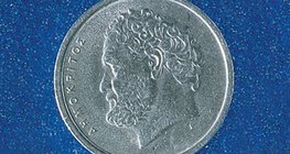 Греческая монета с изображением древнегреческого философа Демокрита