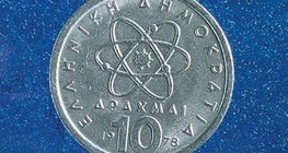 Греческая монета с изображением древнегреческого философа Демокрита