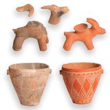 PrehistorischeTöpferware und Kerzenhalter und ihre Rekonstruktionen