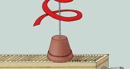 Бумажная змейка, помещённая на тёплый радиатор