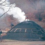 Земляная печь для производства древесного угля